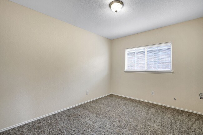 Building Photo - Spacious Brick-Front Home with Loft and Ex...