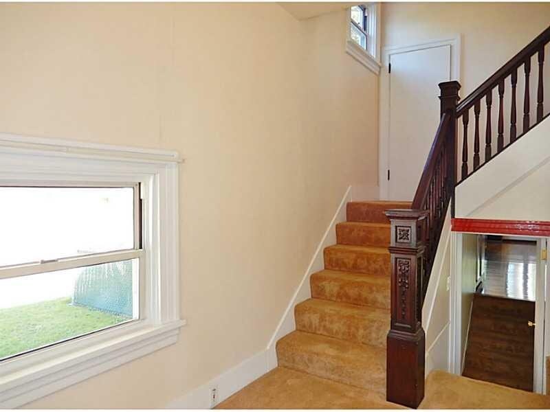 Stairs inside the unit front door. - 329 E Grandview Ave
