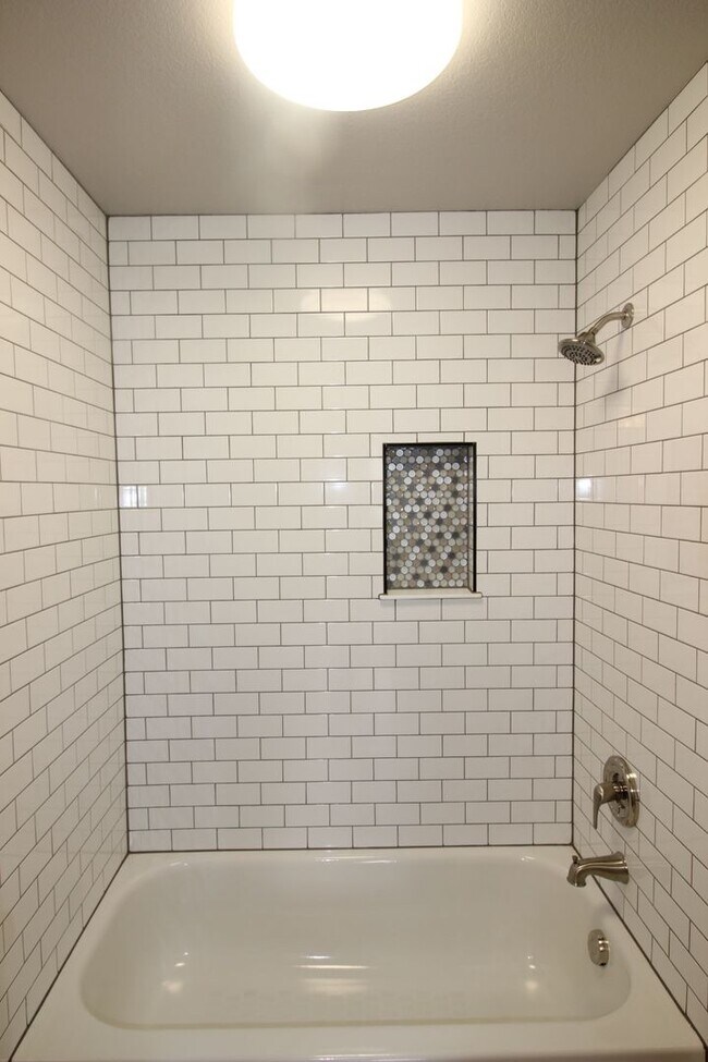 Building Photo - Incredible condo with 2 car garage