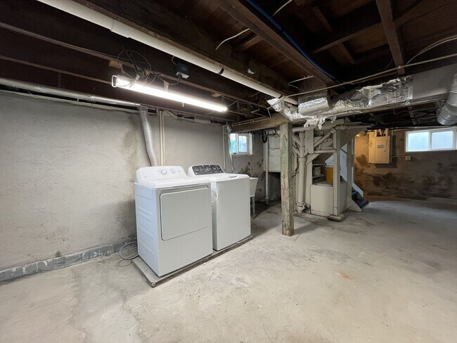 Building Photo - Character-Filled Concordia Home with Flexible Living Spaces & Gas Fireplace