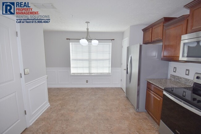 Building Photo - Wonderful 3BR Mboro townhome- GREAT location!
