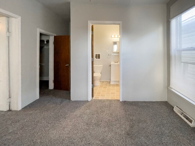 Building Photo - Downtown Home with fence and nice updates ...