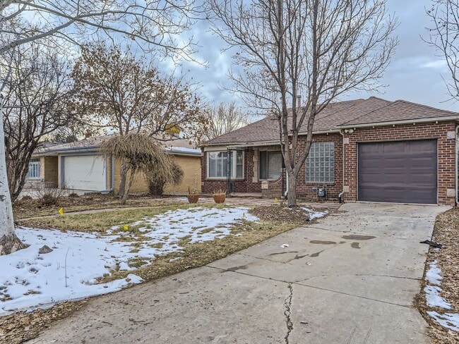 Building Photo - Evolve Real Estate: Available 8/8/26 Brick Tudor with Large Yard and Finished Basement!