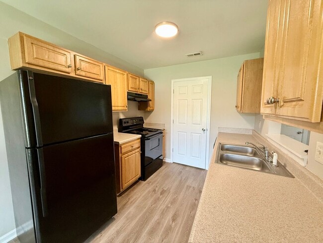 Building Photo - 4605 Palm Breeze Ln