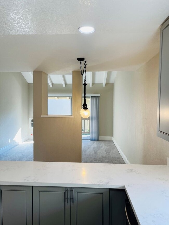Building Photo - Upper Level Condominium in Station West