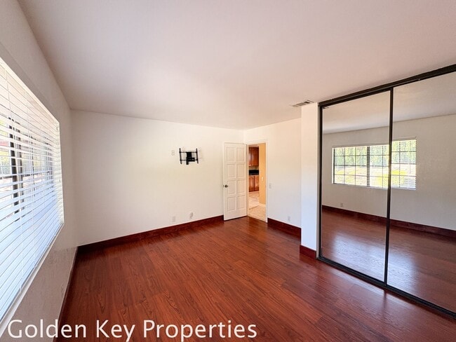 Building Photo - Welcome to this stunning 4-bedroom, 3-bathroom home located in the desirable La Costa neighborhoo...
