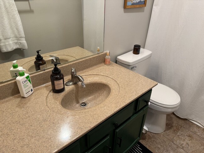 Building Photo - Spacious Corner Townhome with Private Yard...