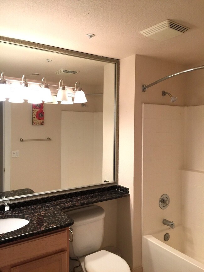 Building Photo - Long or short term available!  Live in lux...