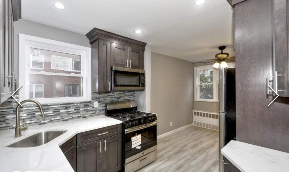 Kitchen into dining nook - 761 E 101st St