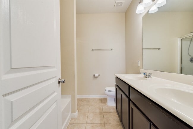 Building Photo - 8127 Running Brook Ln