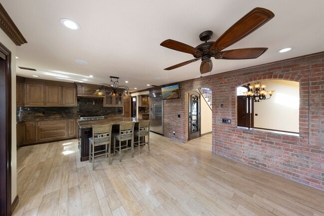 Building Photo - Beautifully maintained Tuscan-style custom home