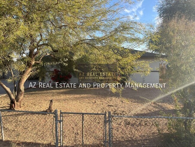 Building Photo - 3841 N 63rd Dr