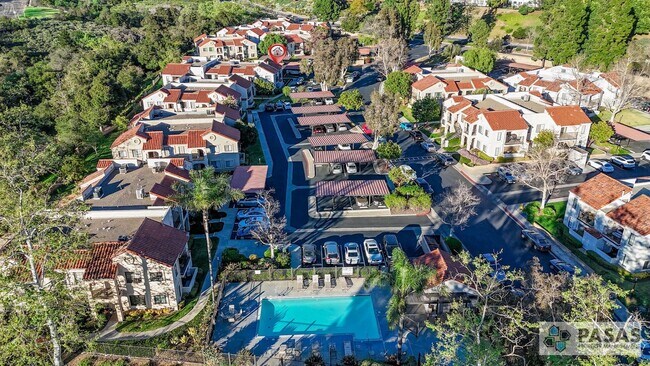 Building Photo - Bright Upgraded Condo w/ Quartz Kitchen, Covered Parking, Pool & Spa