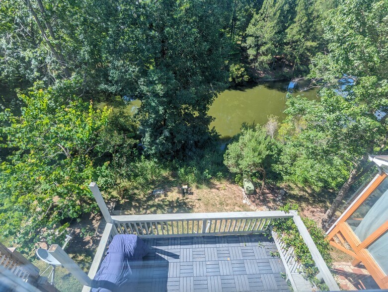deck and back yard view from bedroom 2 - 106 Chandler Chase Ct