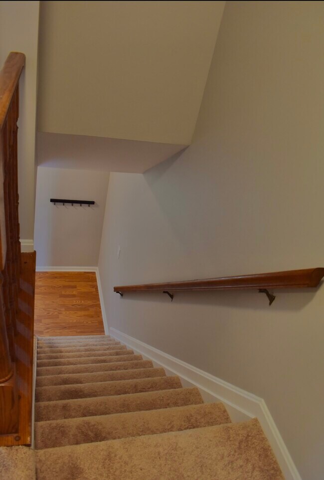 Stairs to upper-level - 5010 Kenilworth Ave