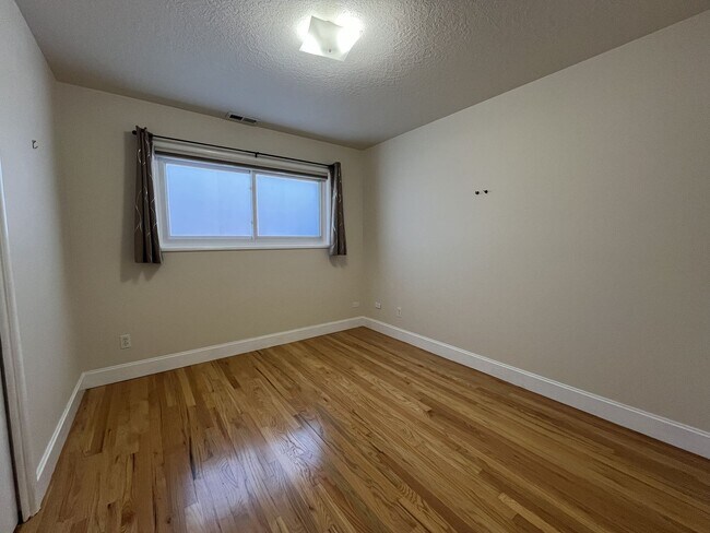 Building Photo - Light-Filled Home with Open Layout, Modern...