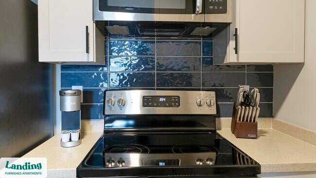 Building Photo - 900 E Six Forks Rd