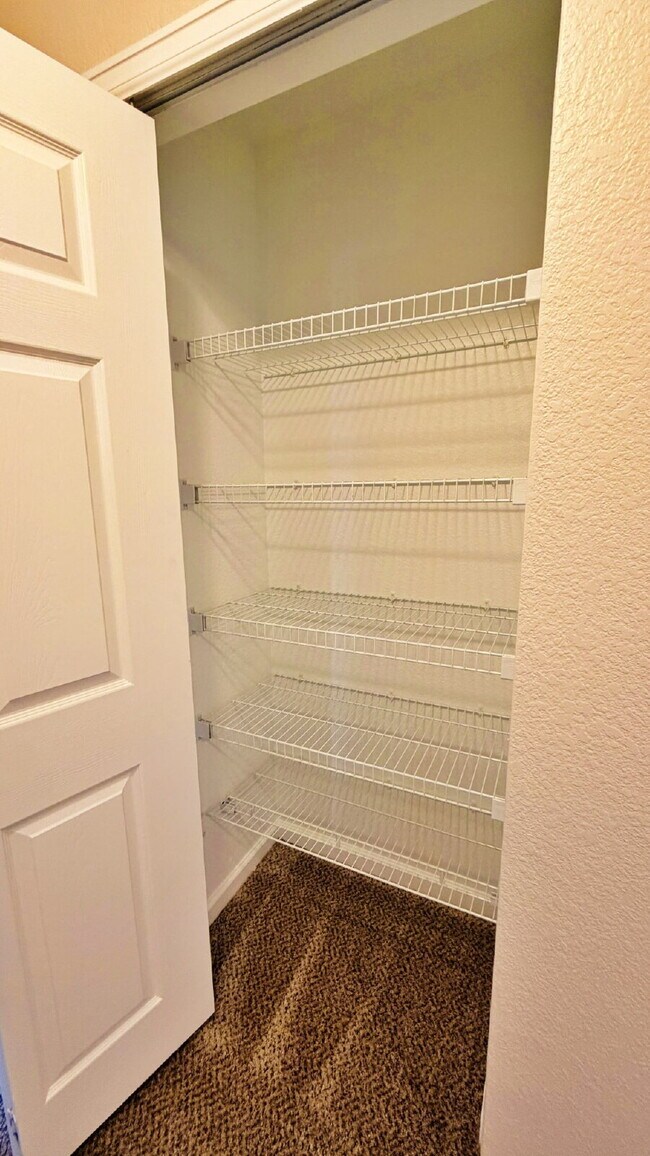 Building Photo - NEW CARPET NEW PAINT!! Clean and Bright 2BR 2BTH Condo Close To DIA. Gated Community in First Cre...