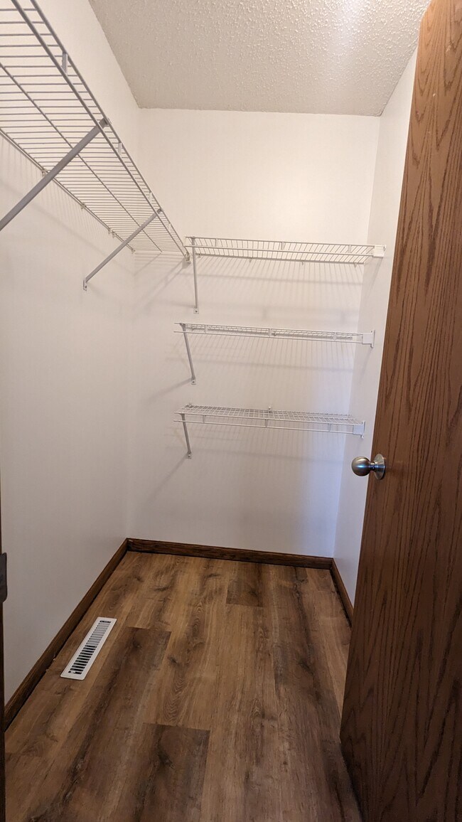 Second bedroom walk-in closet. - 758 Park Brook Rd NW