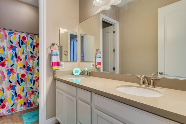 private bathroom double sinks - 18368 W Thunderhill Pl