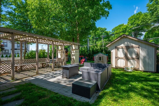 Building Photo - Rare opportunity to lease this Frank Lloyd Wright-inspired Colonial in the highly sought-after Ha...