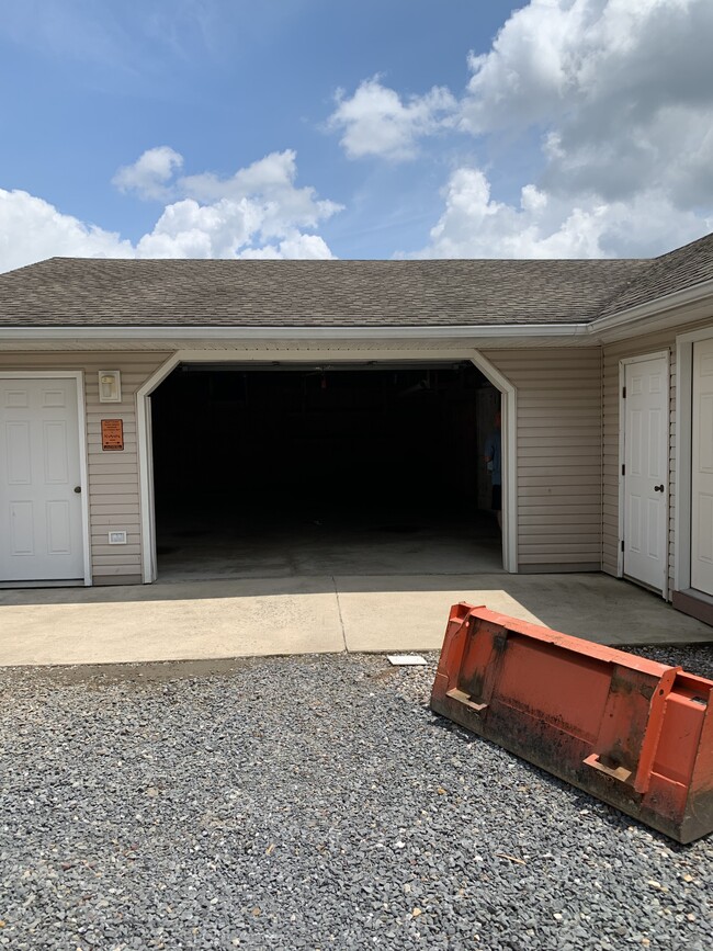 Garages on property for rent - 203 Main St