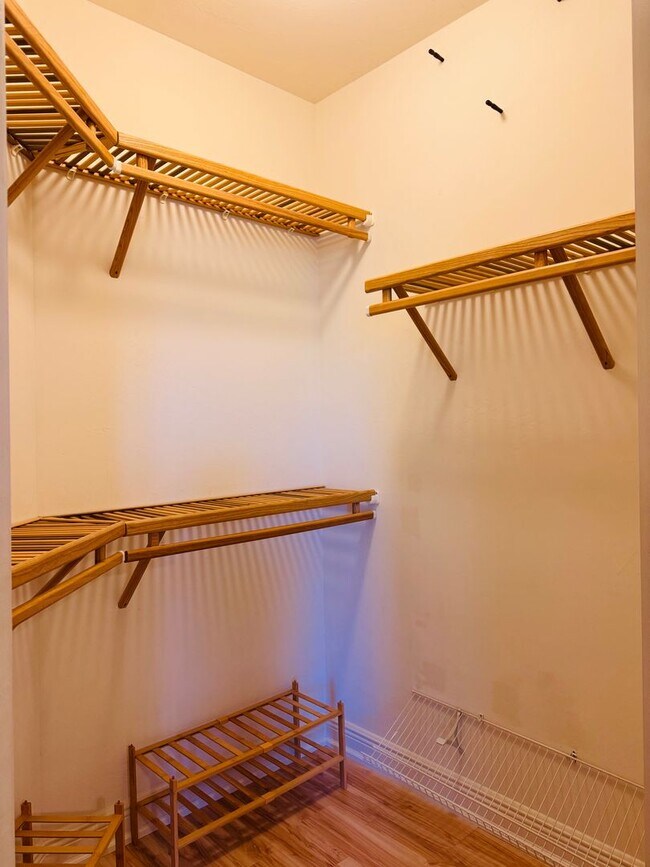 Building Photo - Experience Bell Tower Park. GATED ground floor 2 Bed 2 Bath Den 1 Car Garage Condo.