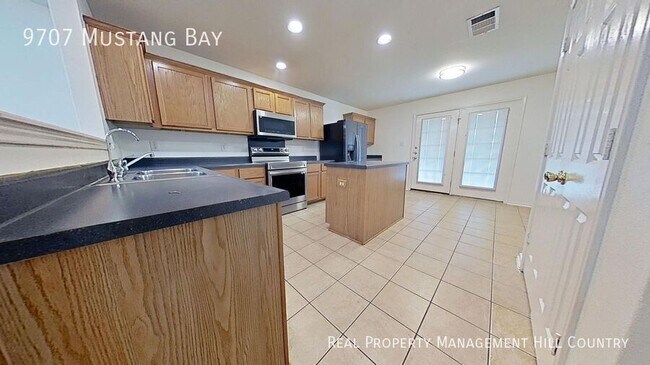 Building Photo - 9707 Mustang Bay