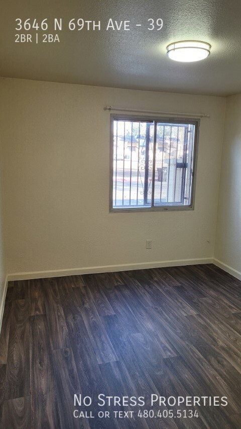 Building Photo - 3646 N 69th Ave