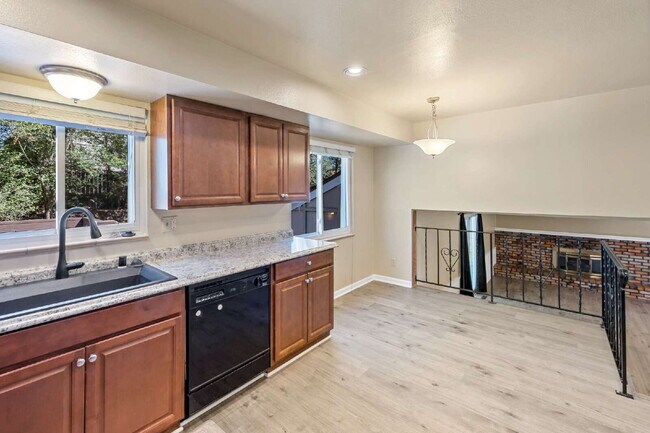 Building Photo - 3-Bedroom with A Flex Room Multi-Level Home with Fresh Paint, Refreshed Deck, and Multiple Living...