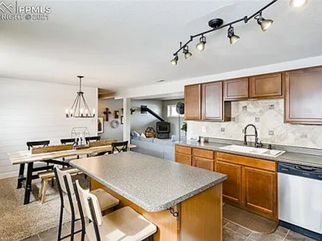 Building Photo - Charming Colorado Springs Home – Spacious ...