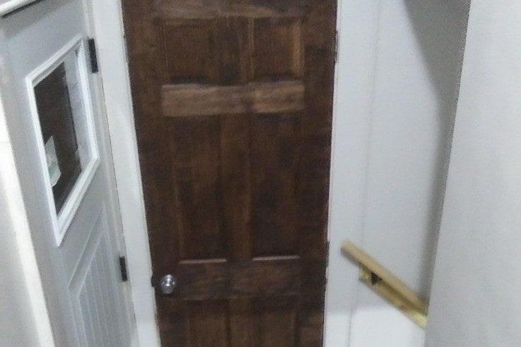 stairs going downstairs and to side door - 1145 s freedom ave