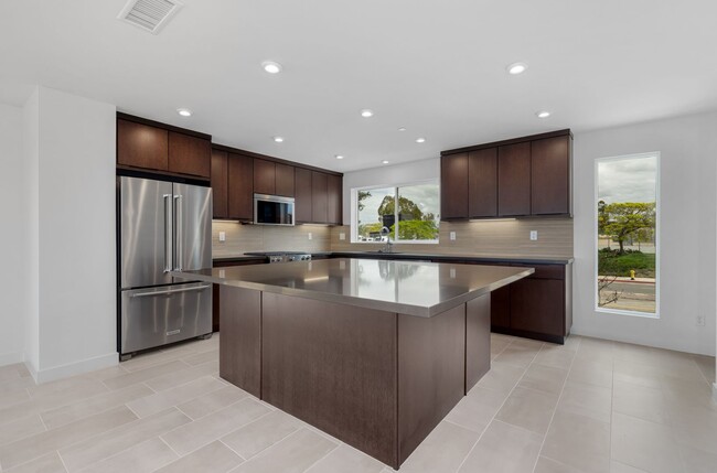 Building Photo - Available now! Brand New 4 Bedroom Townhom...