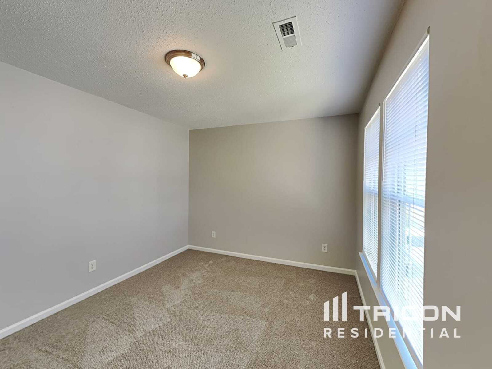Building Photo - 9234 Tiger Lily Ln