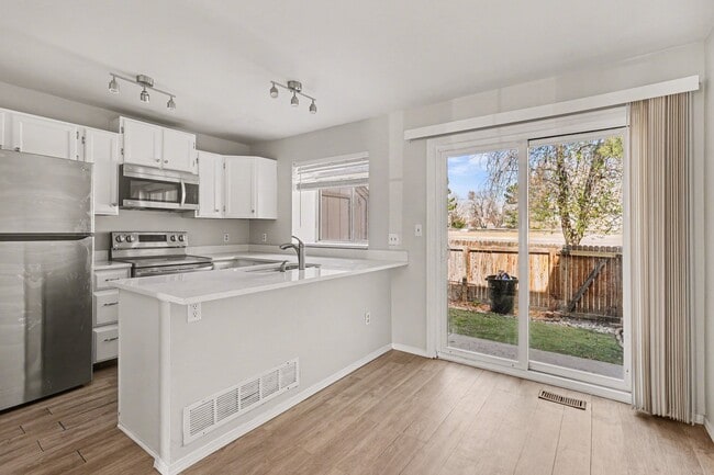 Building Photo - 9696 W Chatfield Ave