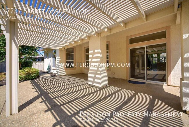 Building Photo - 7237 Secret Garden Loop