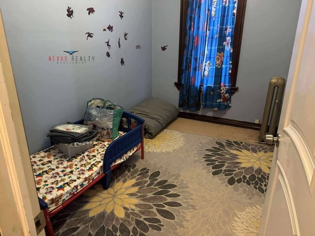 Building Photo - 26-28-28 96th St