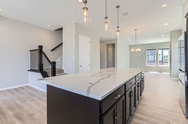 Building Photo - Brand New Build Three-Story Townhome in Er...