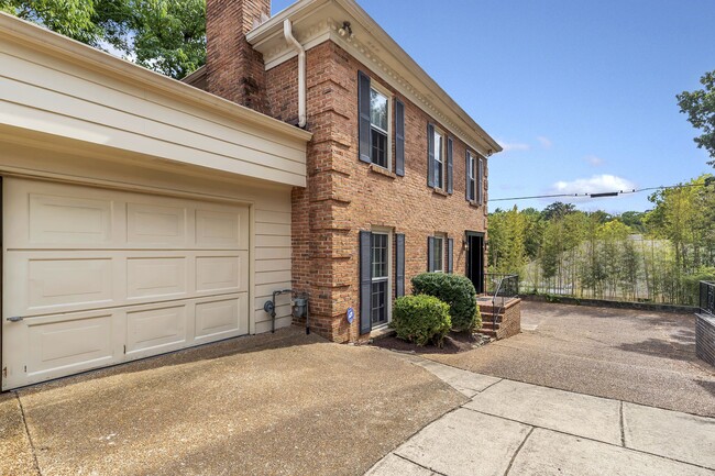 This charming townhome has a one-car garage and ample storage space. - 153B Woodmont Blvd