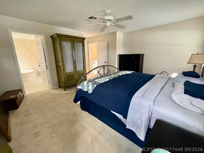 Building Photo - 7702 Majestic Palm Dr