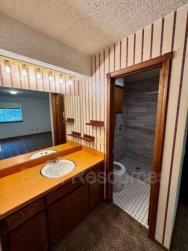 Building Photo - 7002 Woodlake Dr