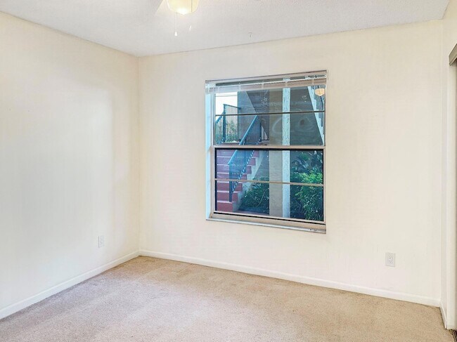 Building Photo - 6090 N Sabal Palm Blvd