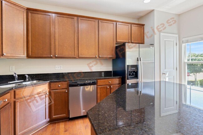 Building Photo - Luxury 3-Story Townhome, No Carpet 4 Bedro...