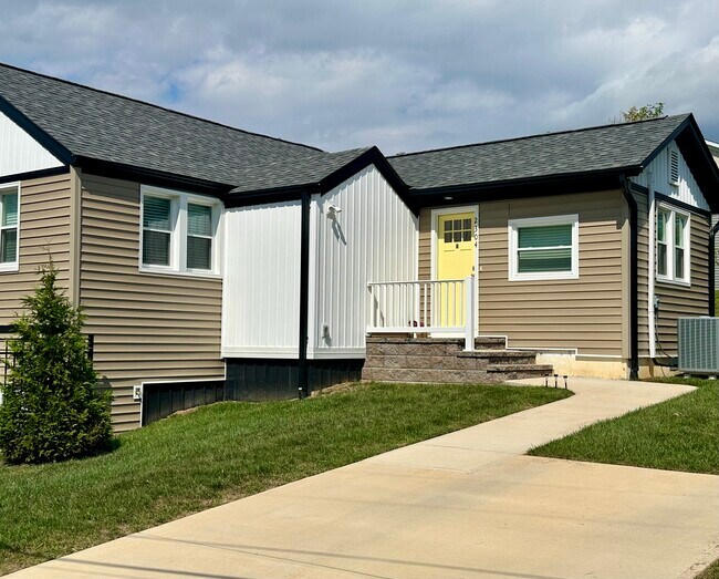 Lighted private entry, flood lights - 2304 Belle Ave NE