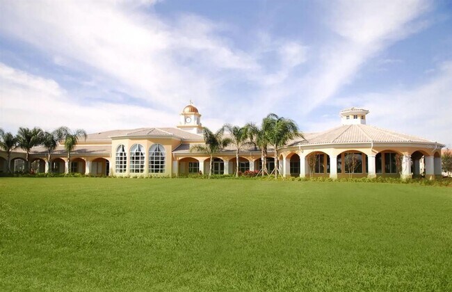 Building Photo - Gorgeous 3/2 Mediterranean Villa with Waterfront Screened Patio and 2-Car Garage in the Prestigio...