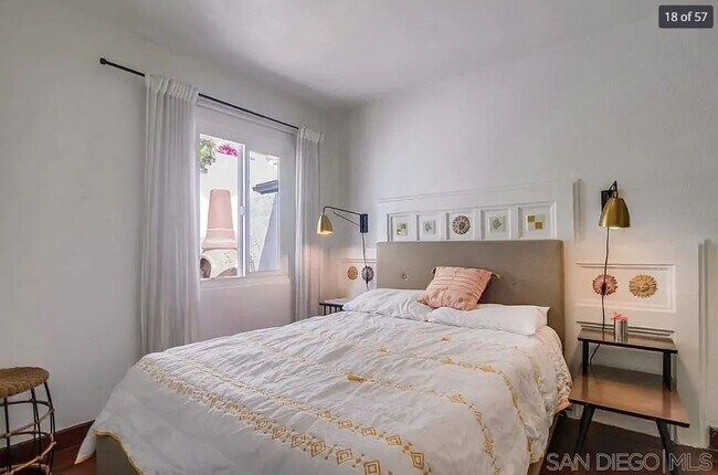 Building Photo - Charming, Fully Furnished Spanish-Style Du...