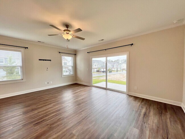 Building Photo - Stunning 3BD, 3BA End Unit Raleigh Townhome on a Corner Lot with High End Features in an HOA Comm...