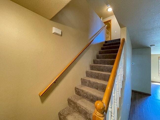 Building Photo - Spacious 4-Bedroom, 2.5-Bath Home with Deck, Fireplace & Updated Kitchen