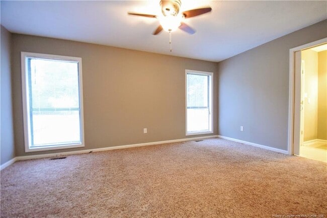 Building Photo - 6933 Woodmark Dr