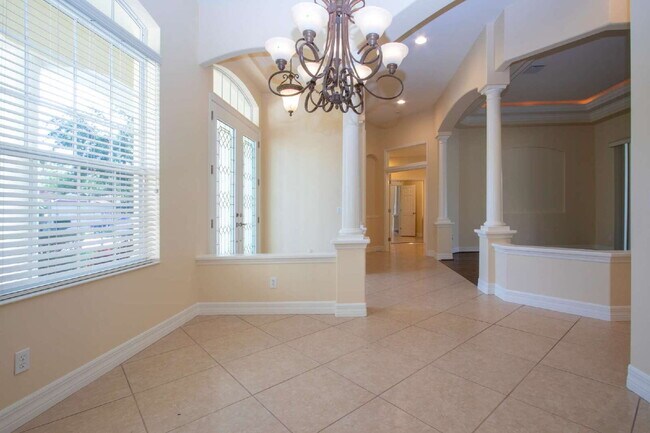 Building Photo - Rarely available executive home in The Hammocks is ready to rent on a long-term lease.